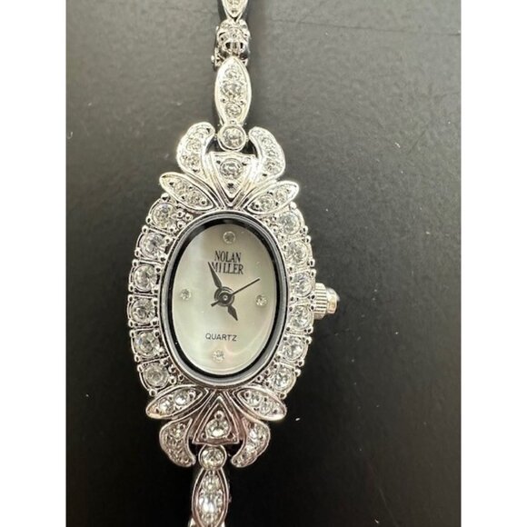 Nolan Miller Watch Women 17mm Crystal MOP Oval Dial Silver Tone 7.25 in HW63 - Picture 1 of 16